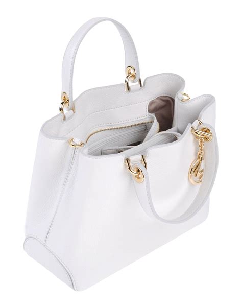 michael kors white leather knock off|are Michael Kors purses real.